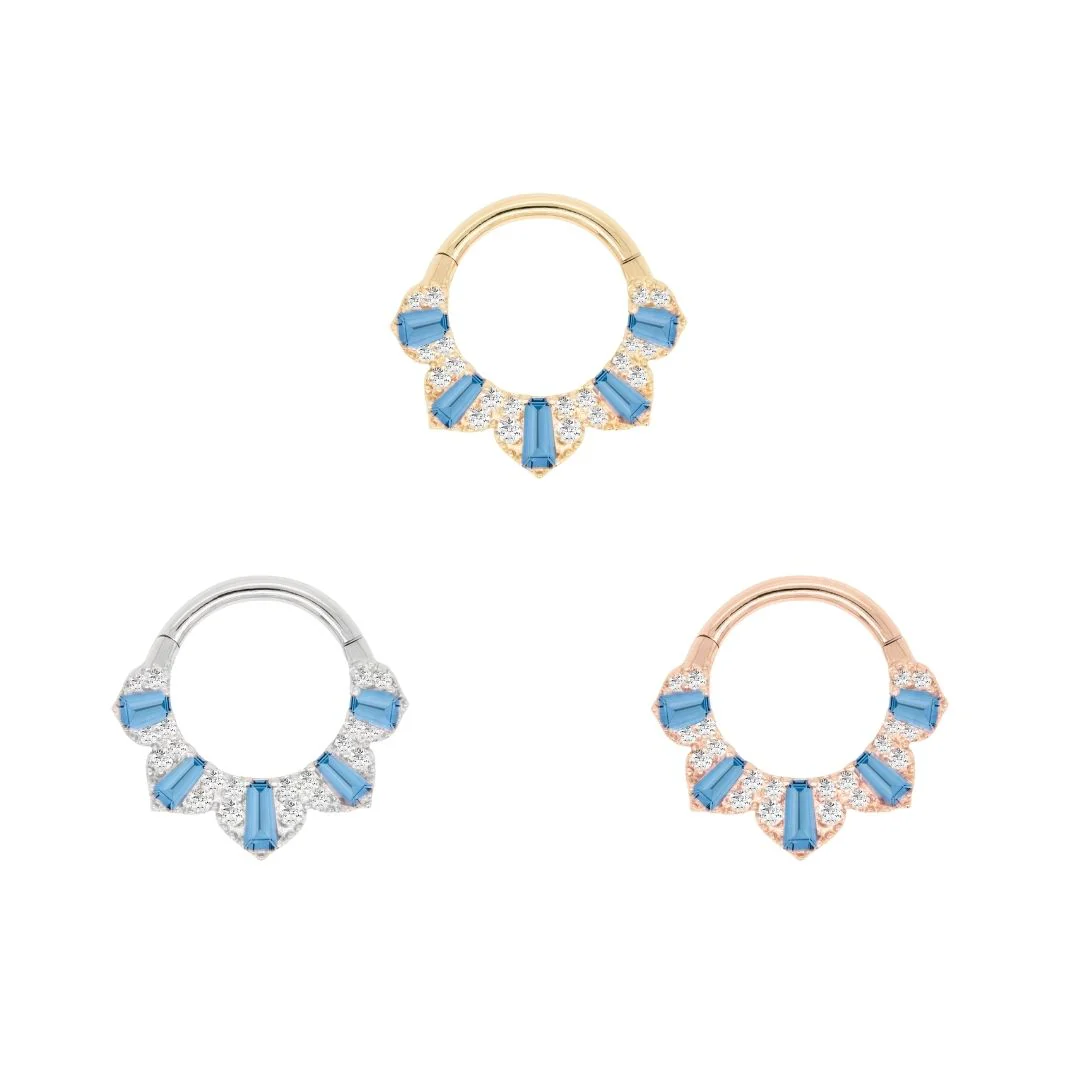 14k gold clicker ring for septum, daith, or helix piercings featuring alternating baguette-cut London blue topaz and pavé-set diamonds in a fan-style design