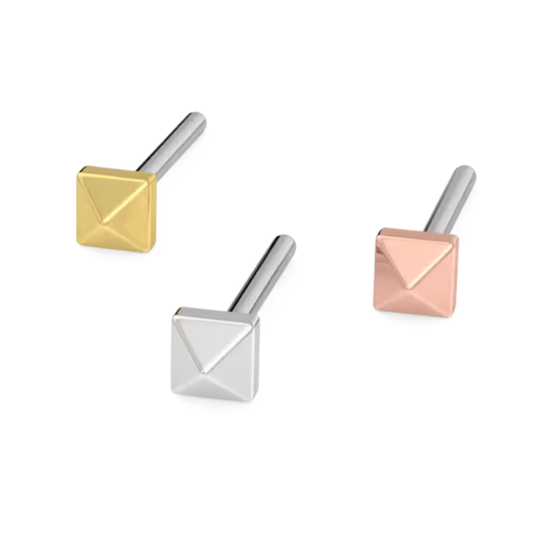 Set of three 14k gold piercing ends in yellow, white, and rose gold, each crafted in a pyramid-shaped stud design with smooth polished surfaces for a minimalist yet striking look.