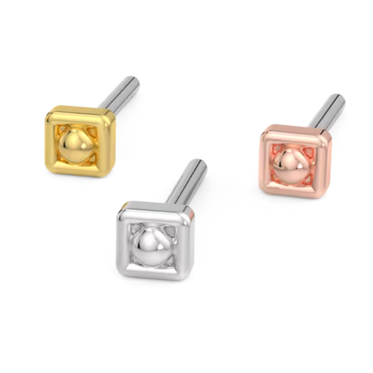 Set of three 14k gold piercing ends in yellow, white, and rose gold, each designed with a polished central bead encased in a square frame for a sleek and contemporary finish.