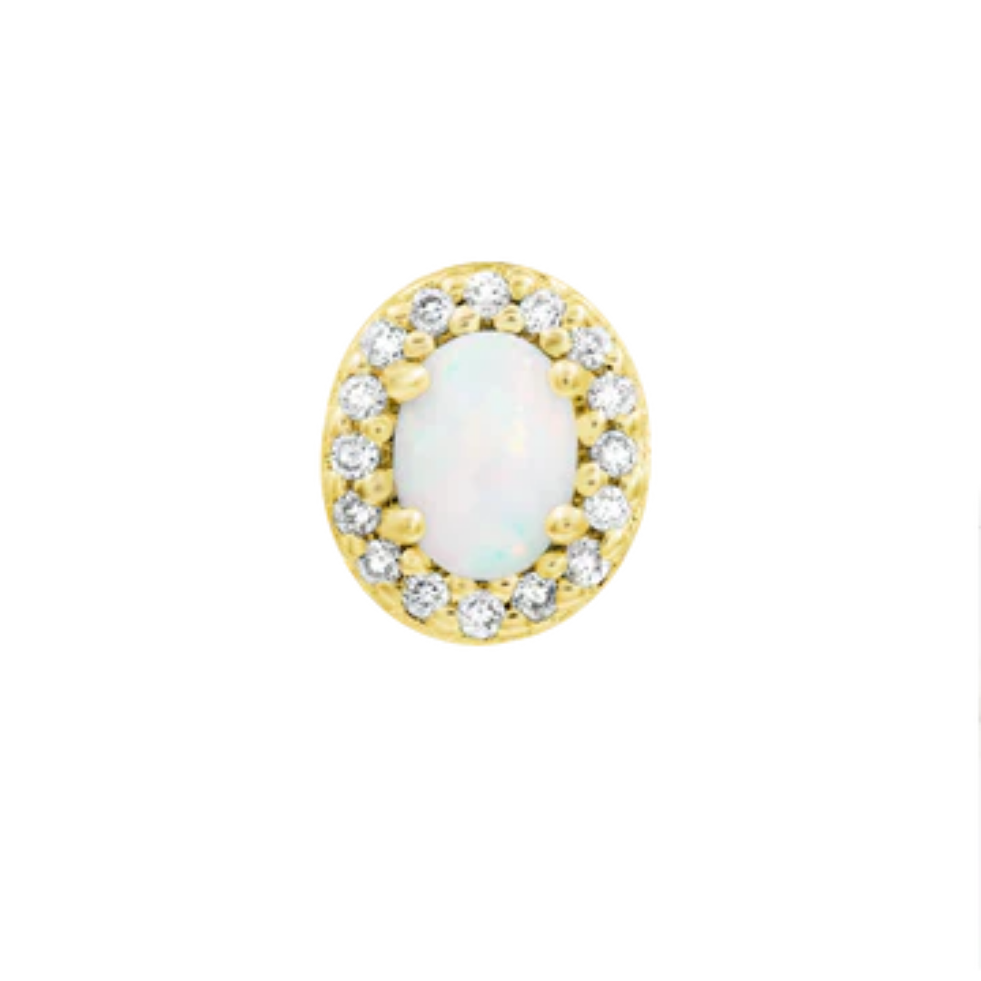 Luxurious gold body jewellery featuring a central white opal surrounded by a halo of sparkling cubic zirconia gems in an oval design