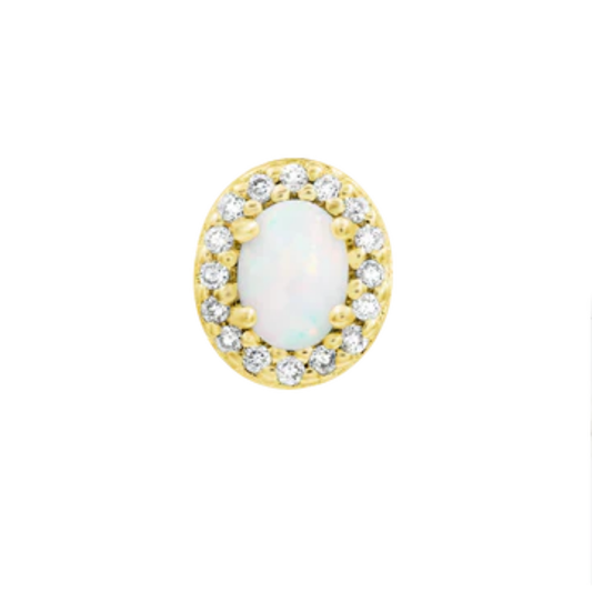 Luxurious gold body jewellery featuring a central white opal surrounded by a halo of sparkling cubic zirconia gems in an oval design