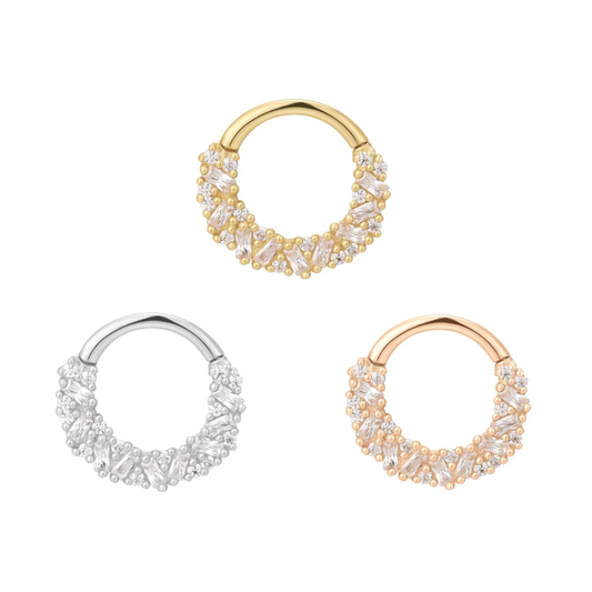 Petty Cash clicker ring in yellow, white, and rose gold with baguette and round cubic zirconia stones – luxury body piercing jewelry