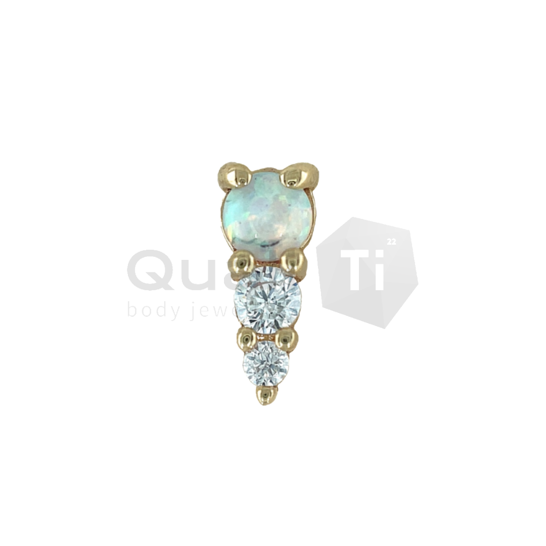 14k yellow gold threadless attachment featuring one round synthetic opal and three graduated cubic zirconia stones in a vertical setting, suitable for lobe, helix, or flat piercings.