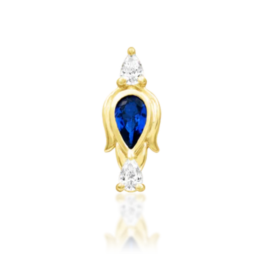 14k gold stud with a royal blue pear-shaped stone framed in gold and flanked by two white CZ teardrops