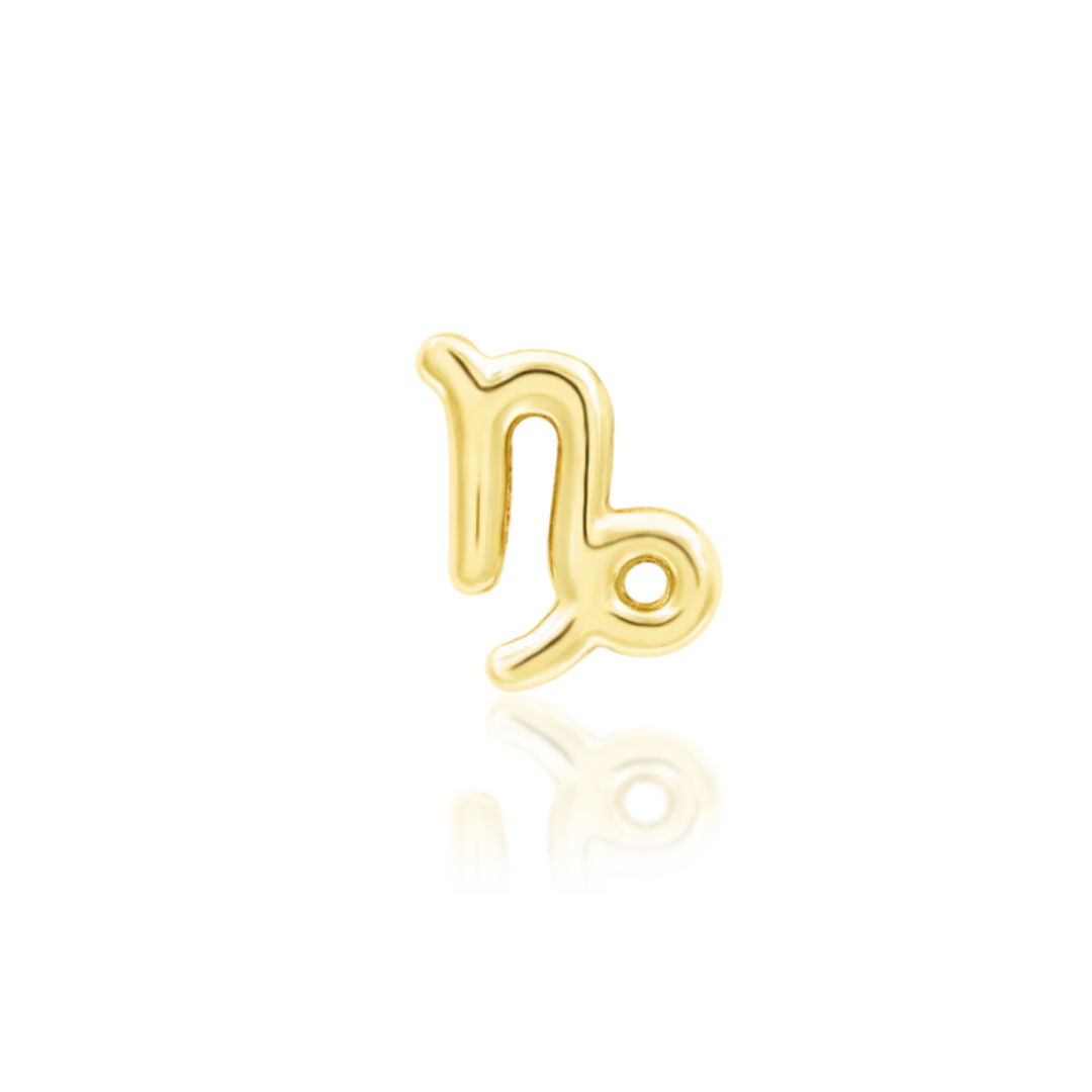 Very shiny 14k gold Capricorn zodiac symbol body jewellery, perfect for helix, flat, or tragus piercings. A sleek, luxurious choice for astrology enthusiasts