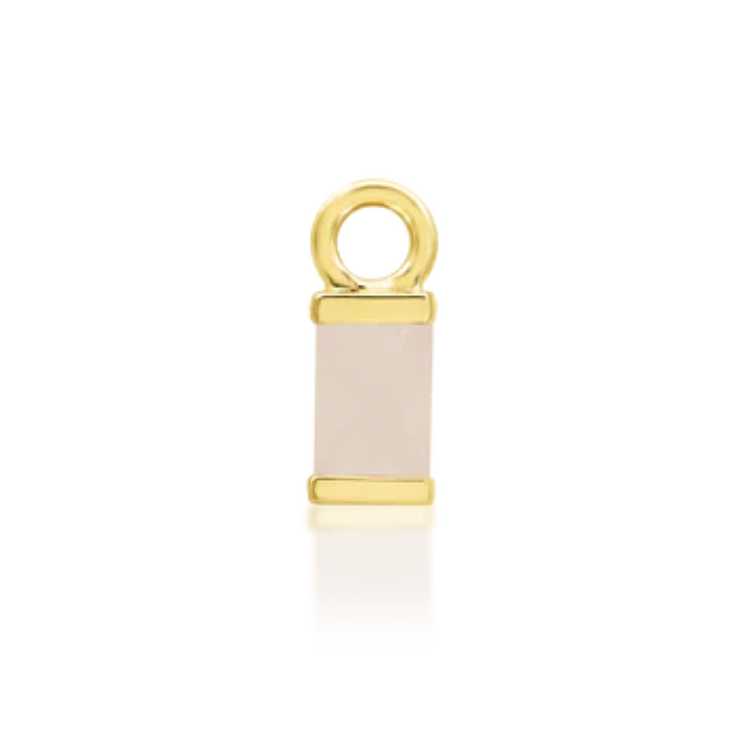 gold rectangular charm with soft pink gemstone and jump ring
