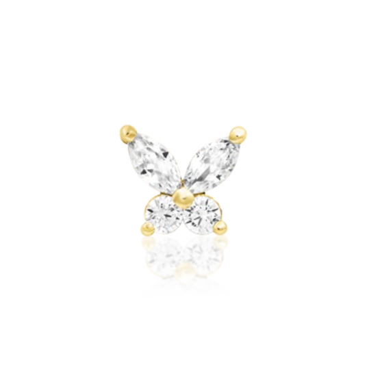 Gold butterfly piercing with four clear CZ stones forming wings on a 14k gold setting