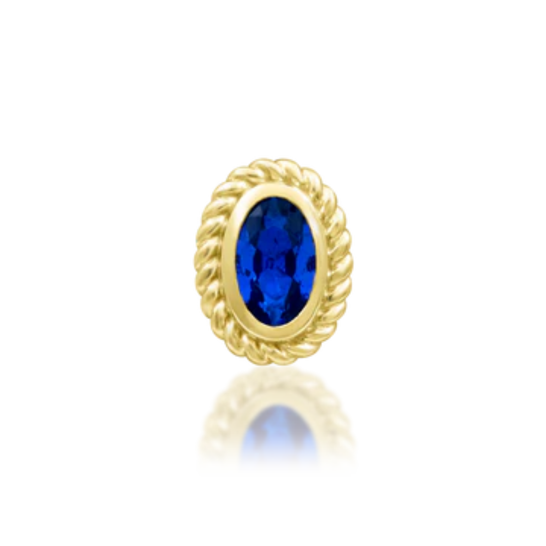 14k gold oval stud with twisted rope bezel and deep blue sapphire-coloured gemstone