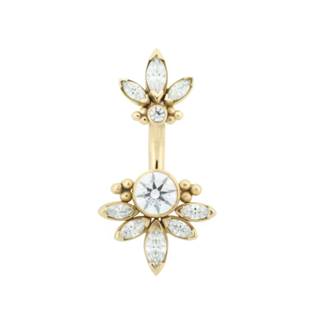 Le Roi Lillian navel bar in 14k gold with bezel-set CZ centre stone, marquise accents, and bead detailing