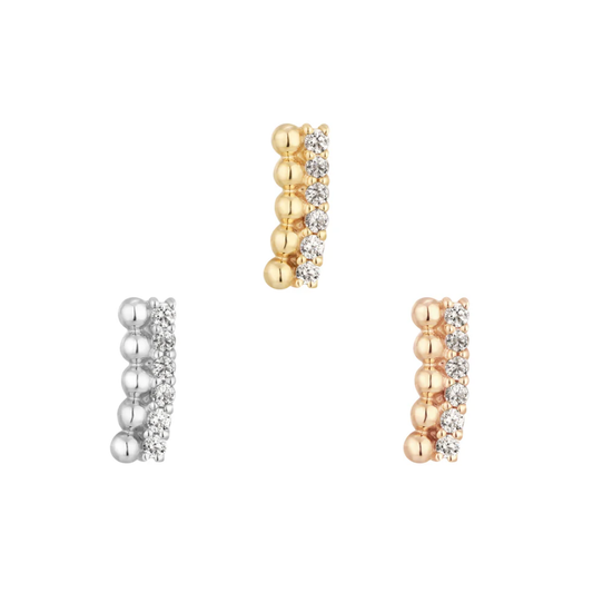 Elegant threadless end featuring a row of cubic zirconia stones set alongside polished gold or silver beads – refined luxury for curated ears