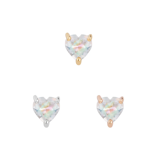 Heart-shaped rainbow moonstone threadless end set in 14k yellow, white, and rose gold, reflecting iridescent hues.
