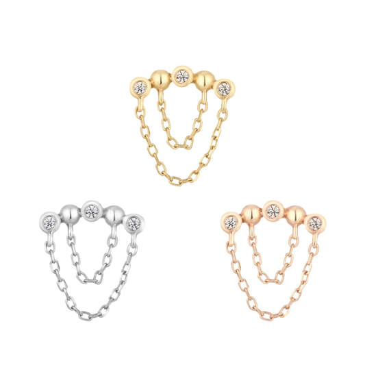 Rumors threadless end with triple bezel-set CZs and double chain detail, available in yellow, white, and rose gold.