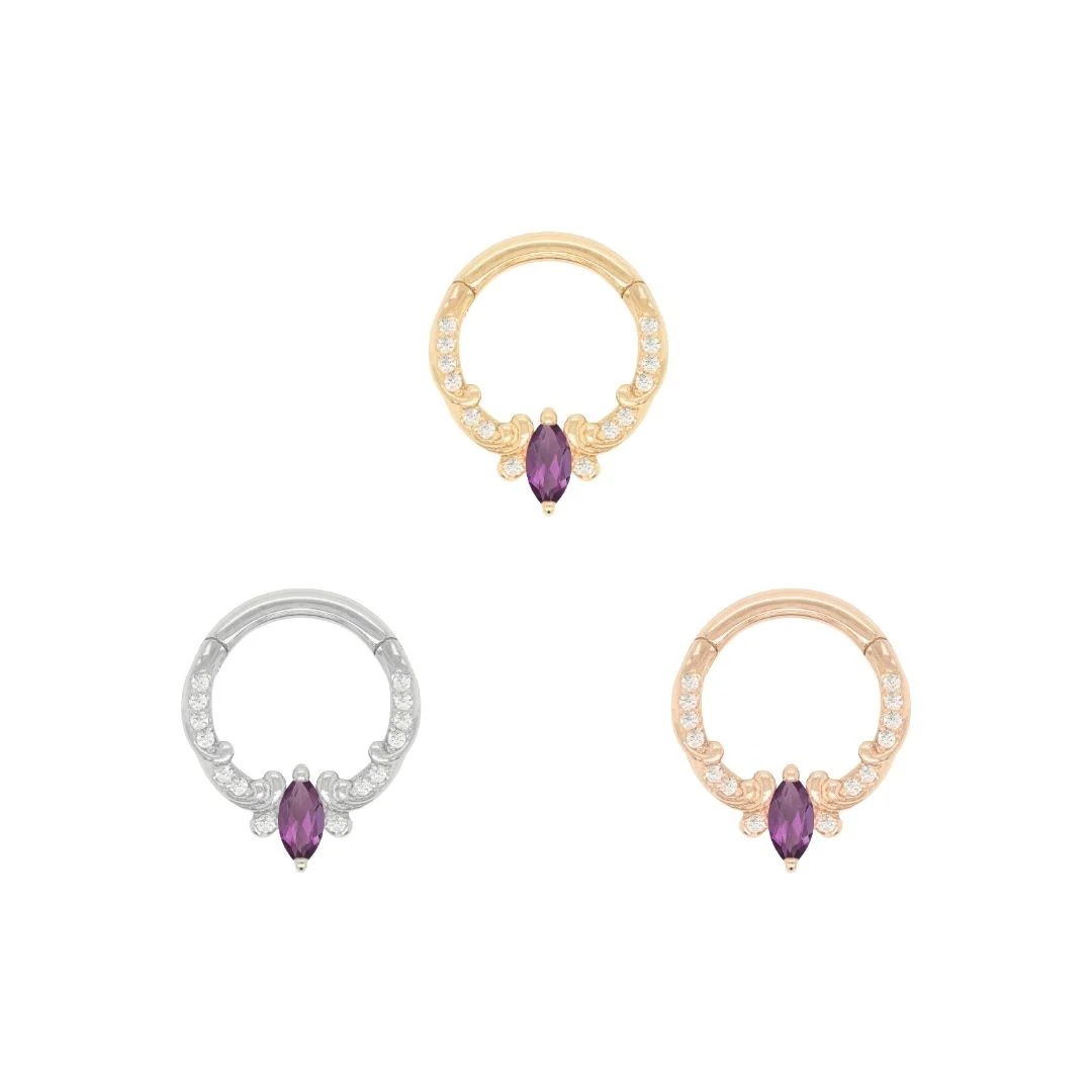 14k gold Coterie clicker ring with marquise cut amethyst and clear accent stones, shown in yellow gold, white gold, and rose gold
