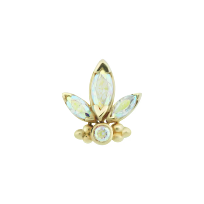 Close-up of a 14k gold piercing end set with three marquise-cut gems and one central round stone, finished with polished gold accents for a radiant and luxurious look.