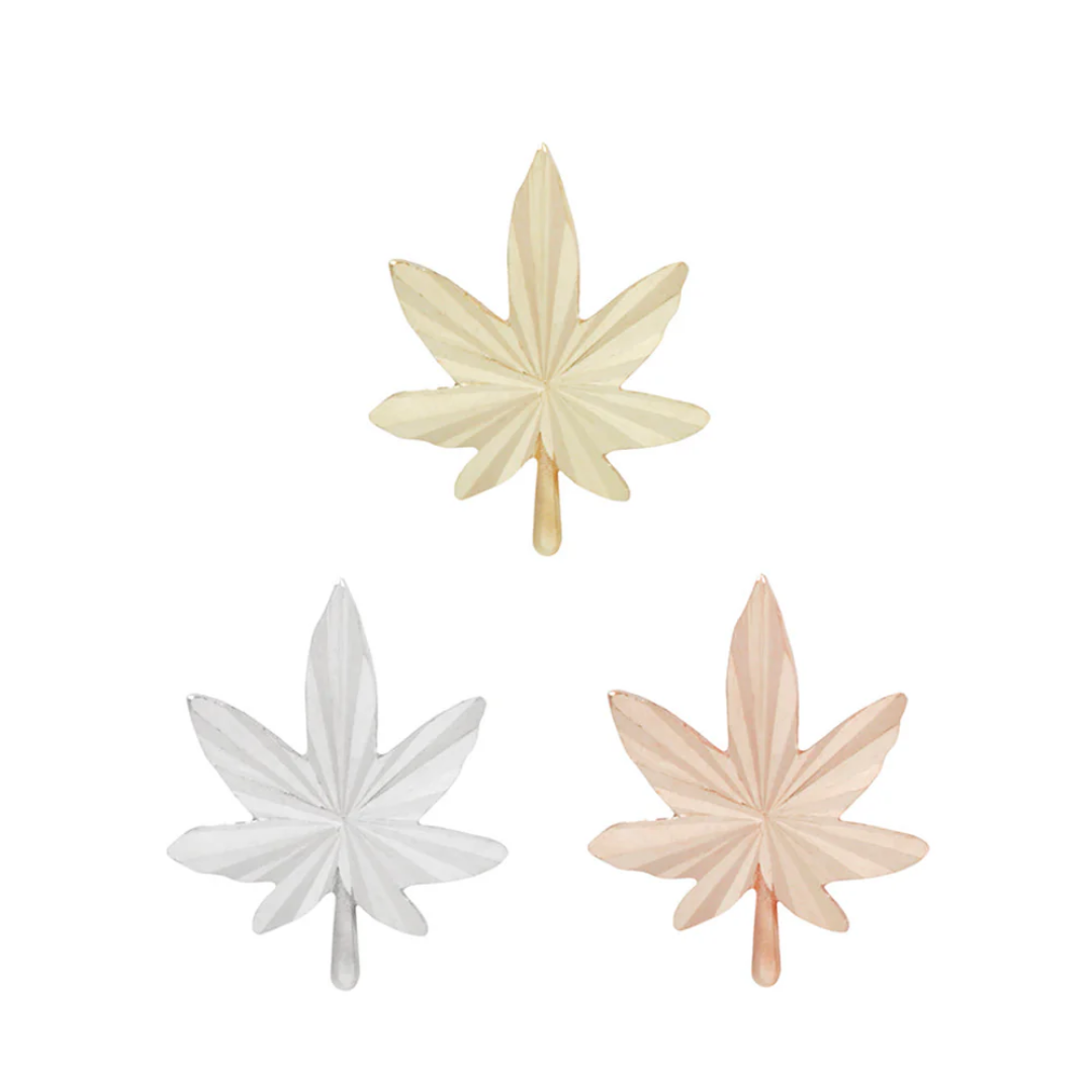 leaf-shaped threadless ends with textured detailing, resembling a stylised cannabis leaf, available in yellow gold, white gold, and rose gold finishes
