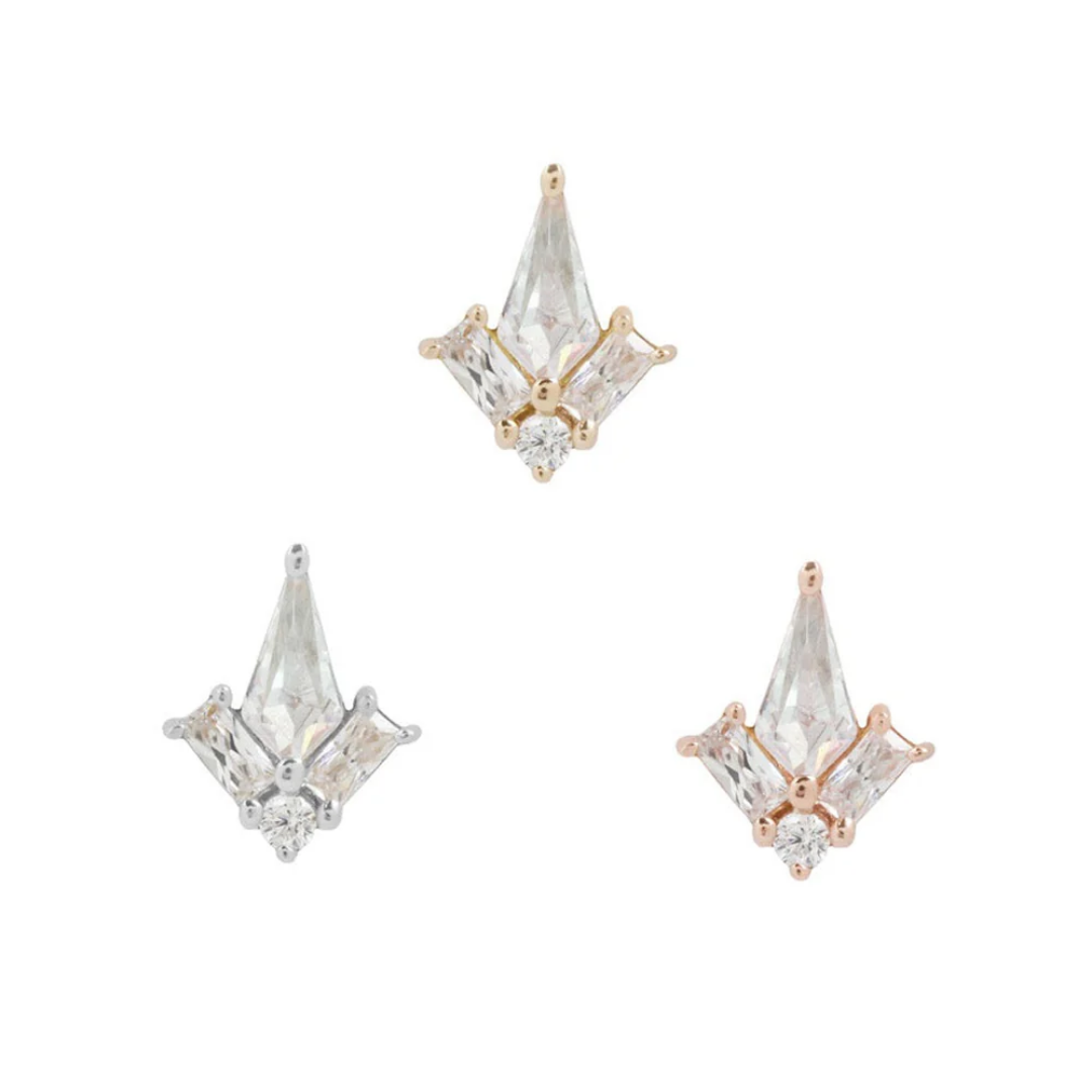 elegant, geometric threadless ends featuring a central pointed CZ stone with two baguette-cut accents and a small round CZ at the base, available in yellow gold, white gold, and rose gold