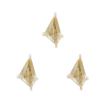 Limelight threadless ends showcasing faceted rutilated quartz in a kite-shaped cut, set in yellow, white, and rose gold prong settings