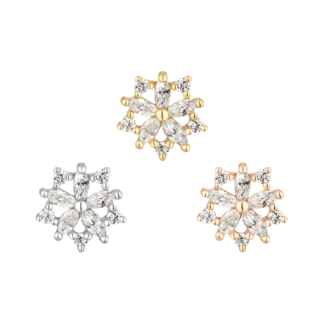 Intricately designed threadless ends with marquise and round-cut CZs forming a radiant floral burst, available in yellow, white, and rose gold.
