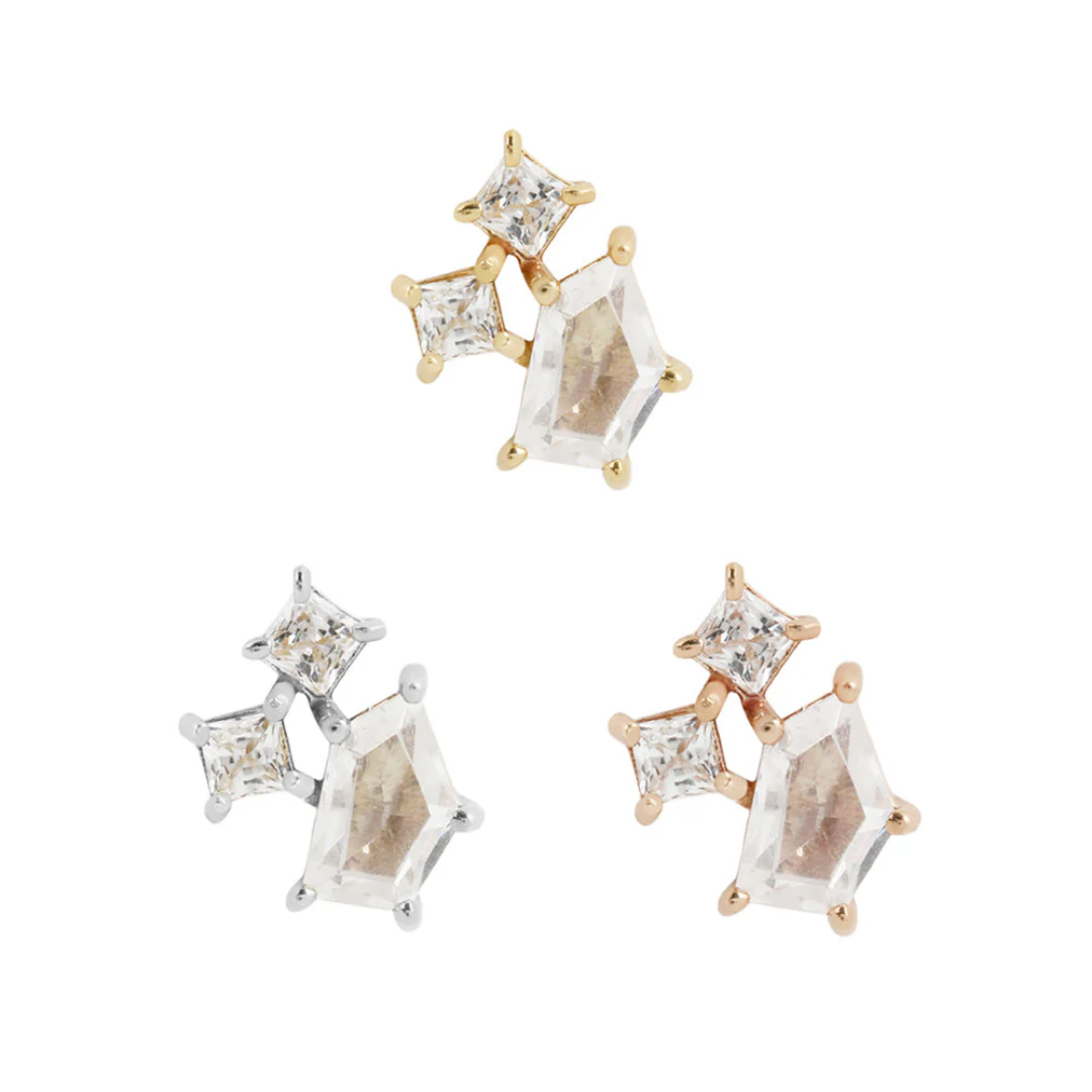 Lyra threadless end featuring a clear cubic zirconia constellation-inspired design, set in prongs and available in yellow, white, and rose gold.