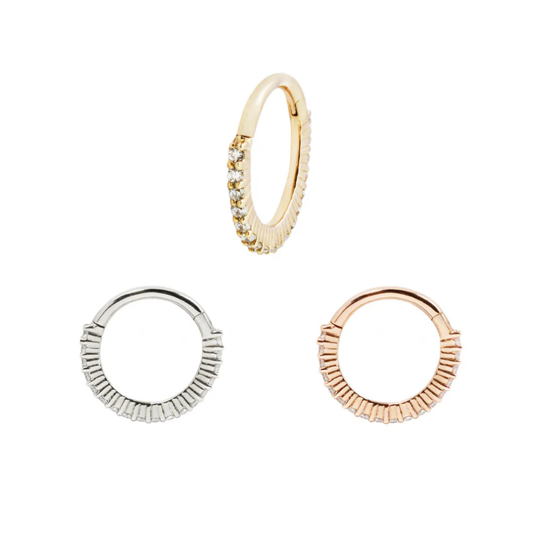 Radiant 16g clicker ring with textured design and cubic zirconia stones in yellow, white, and rose gold – minimalist luxury body jewellery for septum, daith, or helix piercings