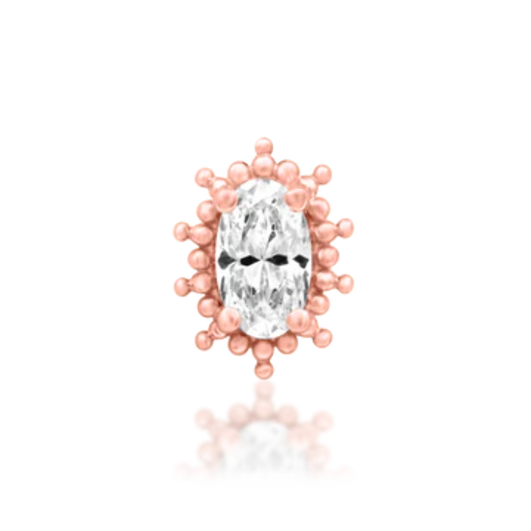14k rose gold piercing end featuring an oval-cut CZ centre stone surrounded by a delicate halo of gold bead detailing