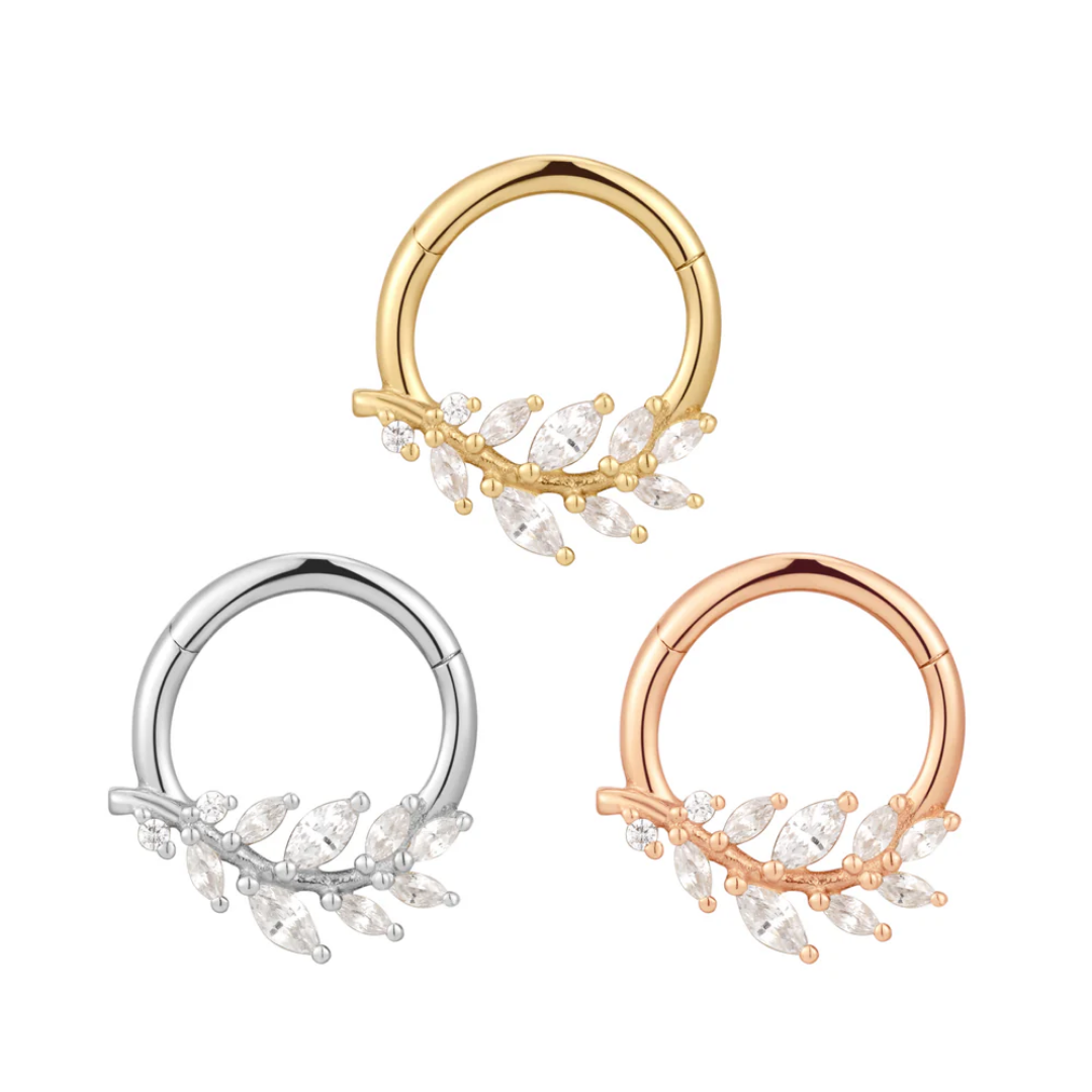 Wild Soul clicker ring with marquise and round cubic zirconia stones in a leafy vine design, available in yellow, white, and rose gold – luxury body jewellery for septum, daith, helix, or conch piercings