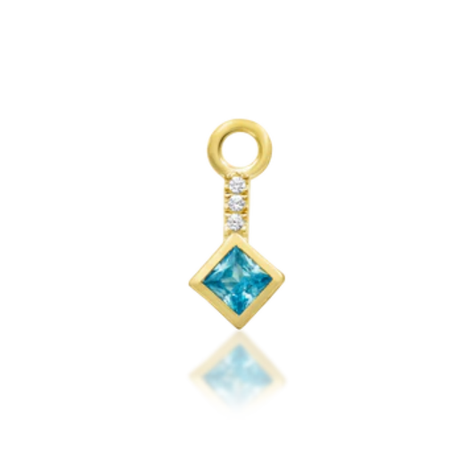 gold dangle charm featuring square-cut blue topaz and pavé CZ detail, luxury piercing jewellery