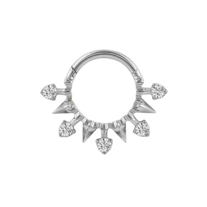 titanium clicker ring with pointed sunburst design and round cz stones shown in polished and gold colour anodised finishes