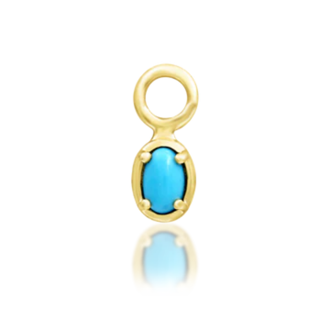 gold Micah charm featuring a vibrant turquoise cabochon in a four-prong setting