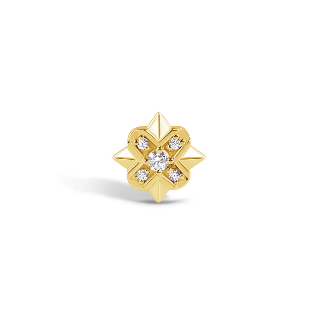 gold norvoch cillian piercing end with geometric pointed petals and a cluster of cz stones