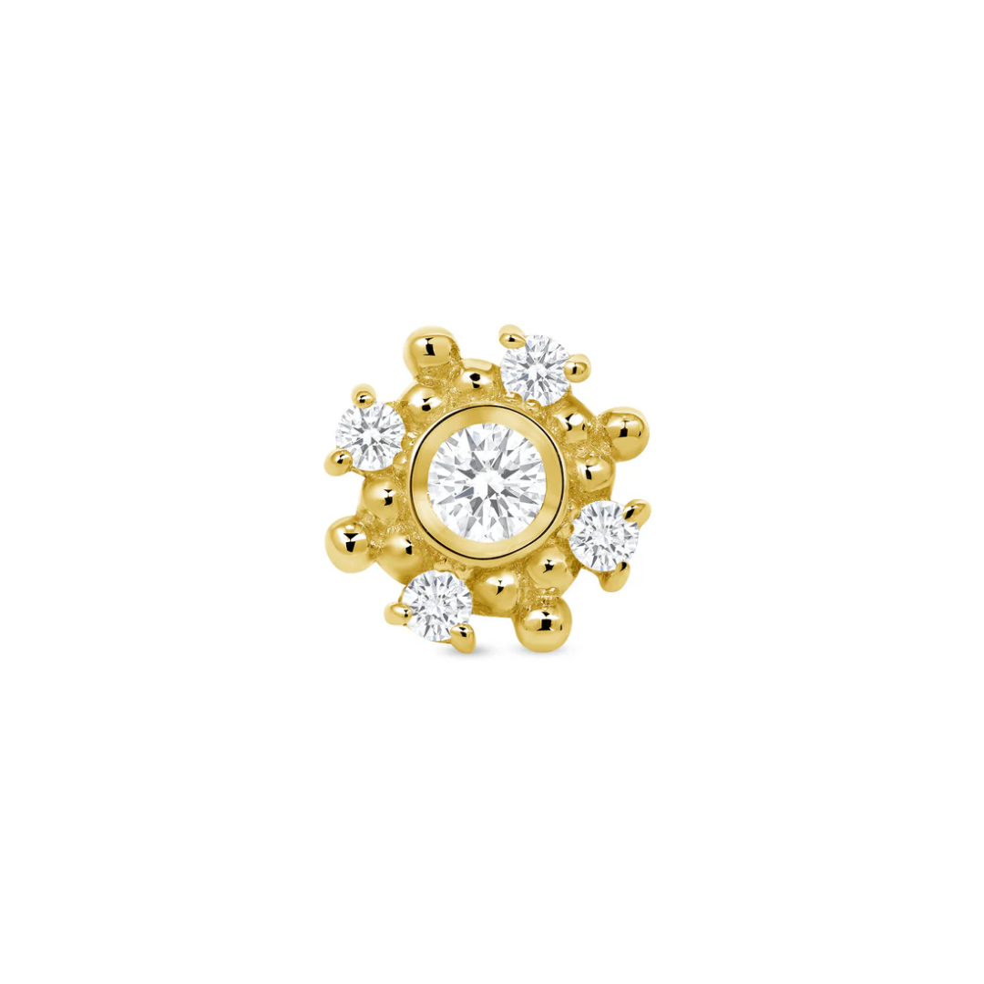 Norvoch gold piercing end featuring a central cubic zirconia surrounded by smaller accent stones and intricate beaded detailing
