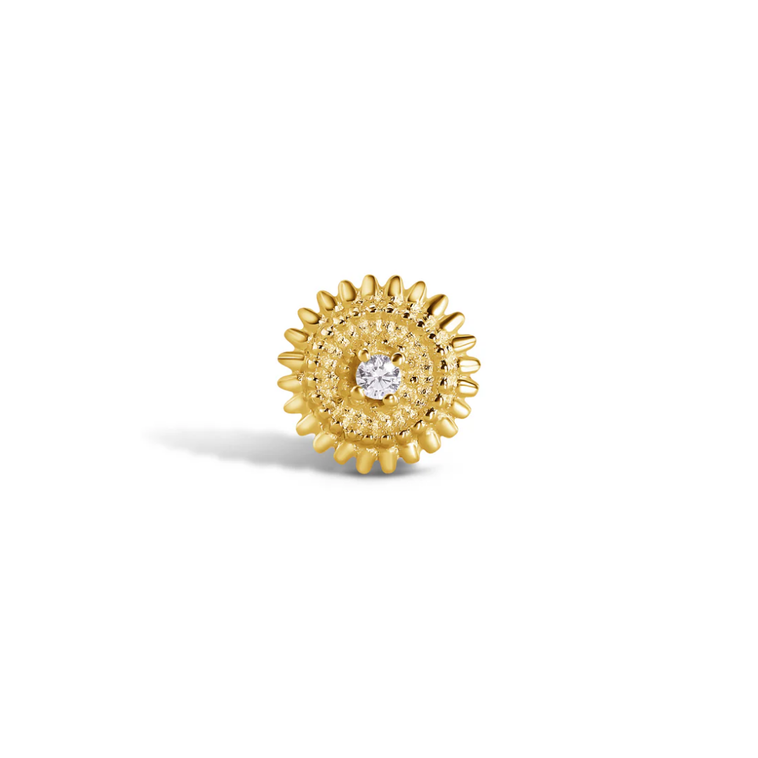 gold sunburst style end with a single central cz stone