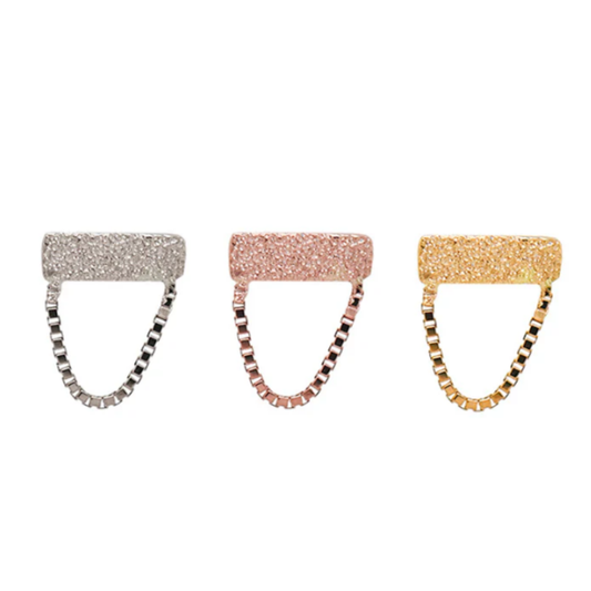 Quetzalli Swing chains in 14k yellow, rose, and white gold, each featuring a textured gold bar with a short, polished box-link chain suspended beneath, displayed on a white background.