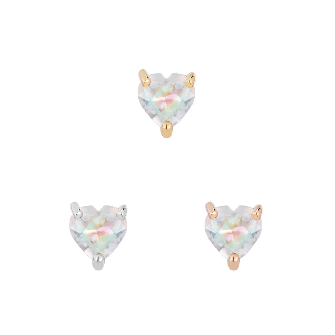 Heart-shaped rainbow moonstone threadless end set in 14k yellow, white, and rose gold, reflecting iridescent hues.