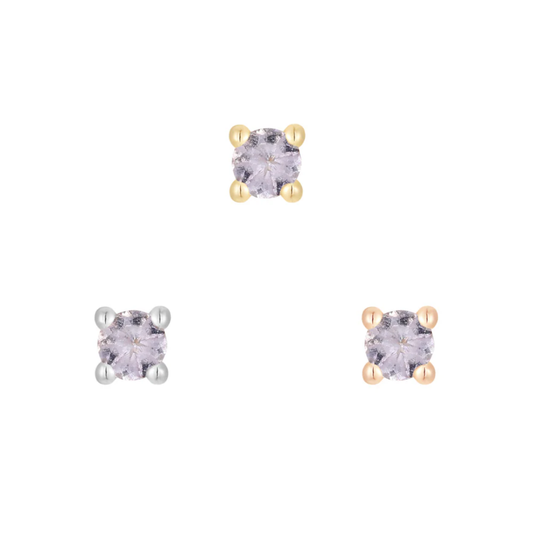 Gold threadless end featuring a round-cut tanzanite gemstone in a classic four-prong setting.