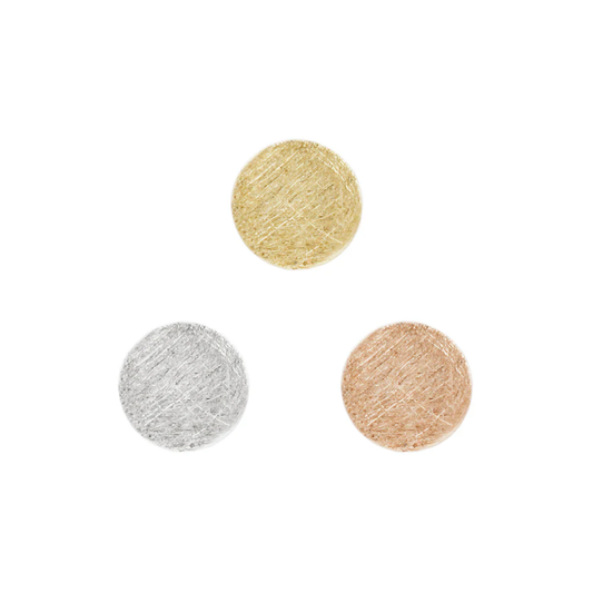Gold threadless end featuring a circular disk with a brushed, textured finish.