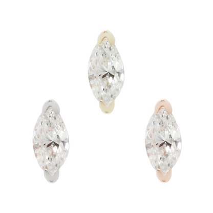 Zuri threadless end in yellow, white, and rose gold with marquise-cut cubic zirconia in a minimalist setting.