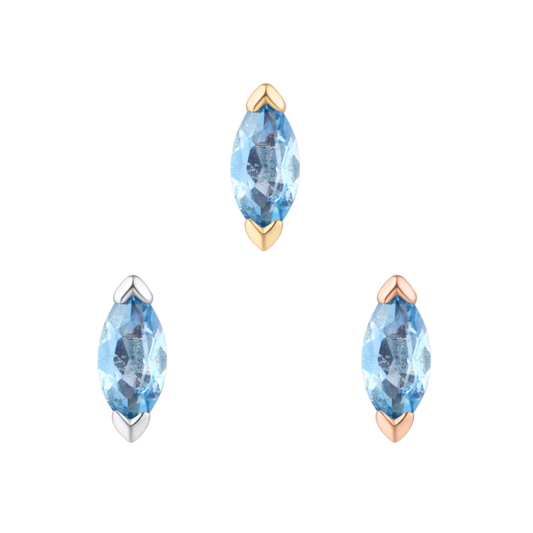 Zuri threadless end with marquise-cut London blue topaz set in yellow, white, and rose gold.